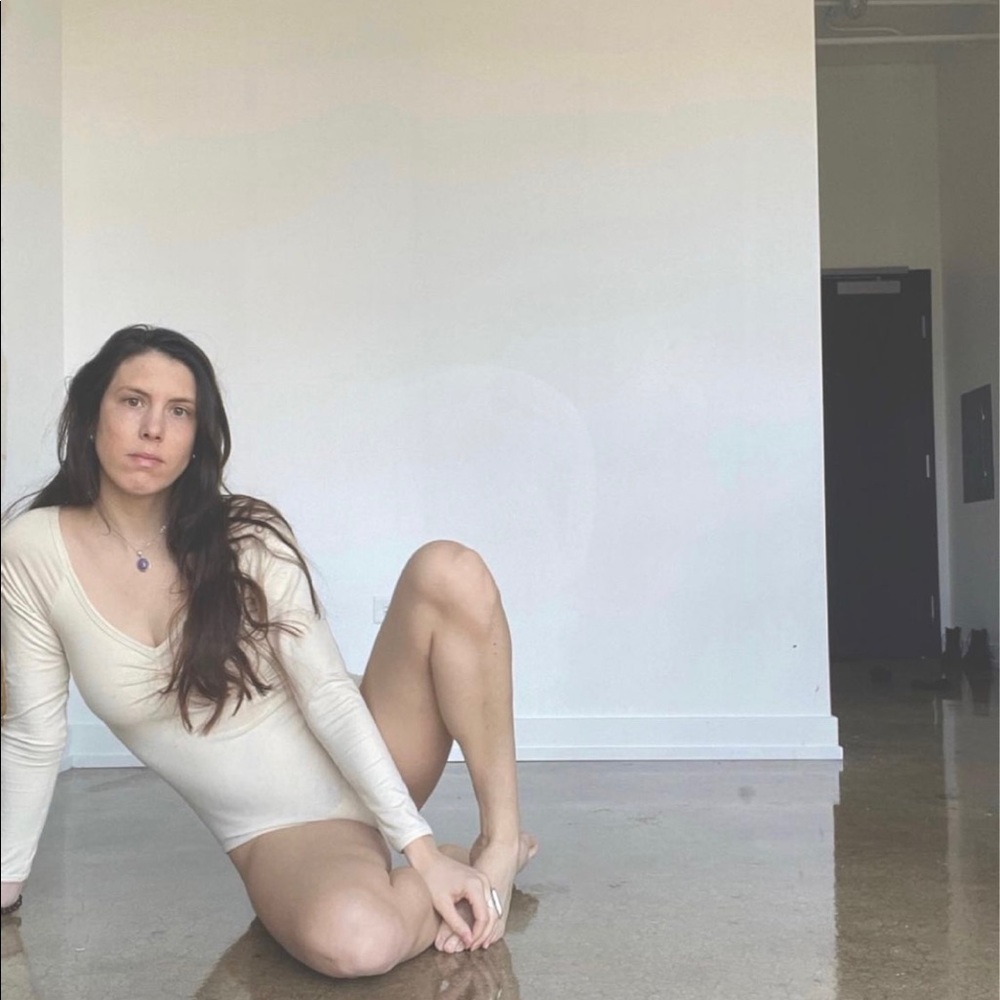 Arq leotard , size medium  color is “cotton” so comfy. Only worn twice !